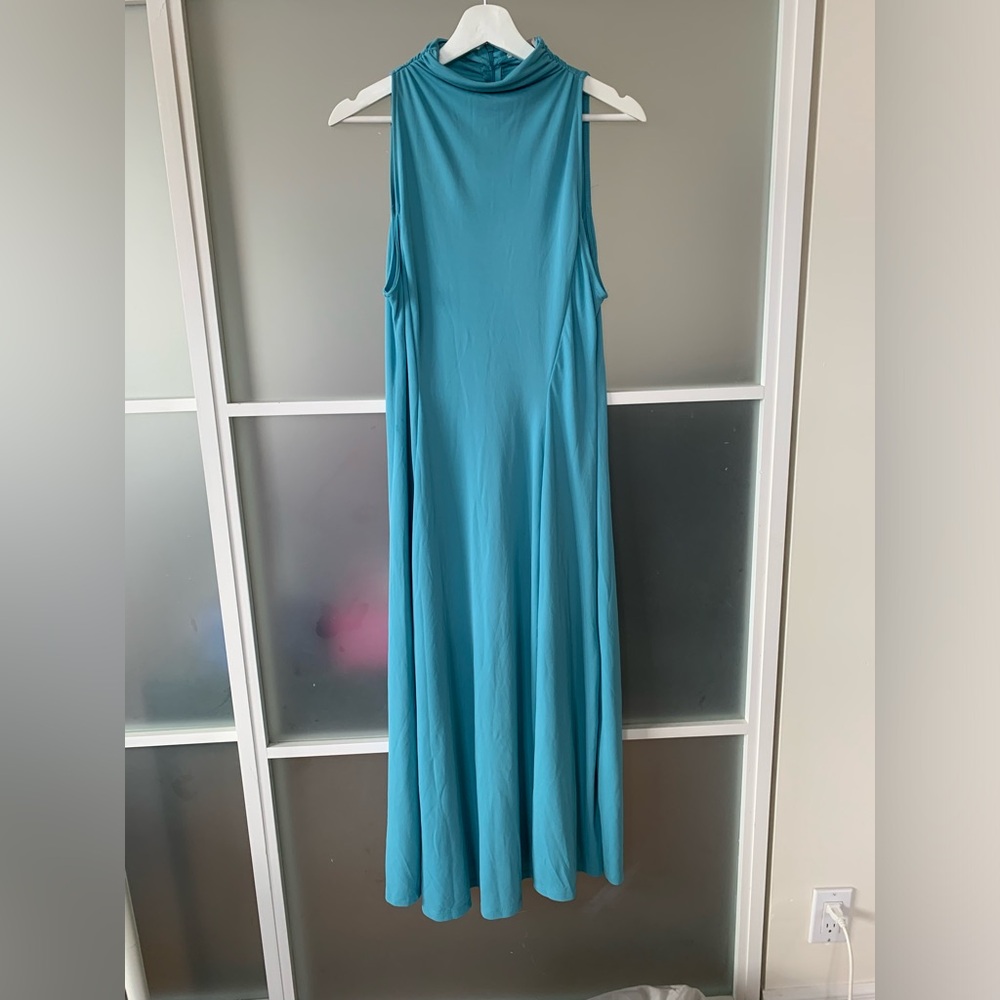 H & M blue midi dress NWT. Size large robins, egg blue, Polly jersey material.